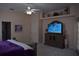 Main bedroom with neutral walls and trim, with views of shelving near the ceiling at 859 Morning Star Dr, Lakeland, FL 33810