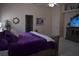 View of main bedroom with closet door and television on top of dresser at 859 Morning Star Dr, Lakeland, FL 33810