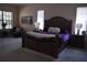 Spacious main bedroom featuring an accent wall, carpeting, and large windows at 859 Morning Star Dr, Lakeland, FL 33810
