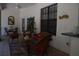 Comfortable covered porch with tile flooring and ample seating at 859 Morning Star Dr, Lakeland, FL 33810