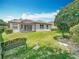 The backyard offers a screened lanai and a well-maintained lawn, perfect for outdoor enjoyment at 903 Kersfield Cir, Lake Mary, FL 32746