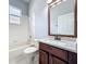 Bright bathroom featuring a shower-tub combination, tile flooring, and a vanity with granite countertops at 903 Kersfield Cir, Lake Mary, FL 32746
