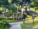 Charming community clubhouse with beautiful landscaping offering a welcoming space for residents to gather and relax at 903 Kersfield Cir, Lake Mary, FL 32746