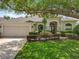 Charming single-story home with a well-manicured lawn and beautiful landscaping, showcasing its curb appeal at 903 Kersfield Cir, Lake Mary, FL 32746