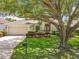 Inviting home exterior with lush landscaping, mature trees, and a charming mailbox by the driveway at 903 Kersfield Cir, Lake Mary, FL 32746