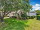 Charming single-story home with beautiful landscaping and a well-maintained lawn at 903 Kersfield Cir, Lake Mary, FL 32746