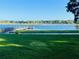 Scenic lake view with a fishing pier and beautiful surroundings offering a serene escape for residents at 903 Kersfield Cir, Lake Mary, FL 32746