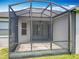 The screened lanai provides a relaxing outdoor space, allowing for enjoyment of the surrounding views at 903 Kersfield Cir, Lake Mary, FL 32746