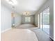 Bright living room with tile entry, ceiling fan, and sliding glass doors to outdoor space at 903 Kersfield Cir, Lake Mary, FL 32746