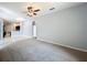 Cozy living area offering a view of the adjacent kitchen and hallway at 903 Kersfield Cir, Lake Mary, FL 32746