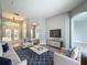 Inviting living room with neutral tones, stylish furniture, and an open layout, perfect for entertaining at 903 Kersfield Cir, Lake Mary, FL 32746