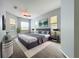 Serene main bedroom with a calming color palette, ample natural light, and stylish furnishings, creating a relaxing retreat at 903 Kersfield Cir, Lake Mary, FL 32746