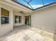 Covered patio with ceiling fan, offering a comfortable space for outdoor relaxation at 903 Kersfield Cir, Lake Mary, FL 32746