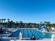Resort-style community pool area with cabanas offering residents a luxurious and relaxing experience at 903 Kersfield Cir, Lake Mary, FL 32746