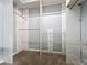 Walk-in closet includes shelving and hanging rods for optimal organization and clothing storage at 903 Kersfield Cir, Lake Mary, FL 32746