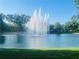 A serene lake view with a beautiful water fountain, creating a peaceful ambiance in the community at 903 Kersfield Cir, Lake Mary, FL 32746