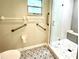 Accessible bathroom with grab bars and shower at 9490 Sw 85Th Ave # E, Ocala, FL 34481