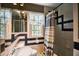 Well-lit bathroom featuring a window and vanity at 1000 Pennsylvania Ave, Lakeland, FL 33803