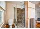 Bathroom with a modern glass shower and tiled walls at 1000 Pennsylvania Ave, Lakeland, FL 33803