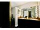 Bathroom featuring vanity with Hollywood-style lighting at 1000 Pennsylvania Ave, Lakeland, FL 33803