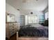Bedroom with hardwood floors and built-in shelving at 1000 Pennsylvania Ave, Lakeland, FL 33803