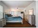 Bedroom with hardwood floors and ceiling fan at 1000 Pennsylvania Ave, Lakeland, FL 33803
