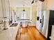 Updated kitchen featuring stainless steel appliances, a cozy breakfast nook, and modern countertops at 1000 Pennsylvania Ave, Lakeland, FL 33803
