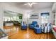 Bright, spacious living room with hardwood floors, stylish furnishings, and plenty of natural light at 1000 Pennsylvania Ave, Lakeland, FL 33803