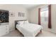 Comfortable bedroom featuring a plush bed, closet and a large window with lots of natural light at 12936 Freeman St, Windermere, FL 34786