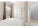 Well-lit bedroom with cozy carpet, closet, and a large window with lots of natural light at 12936 Freeman St, Windermere, FL 34786
