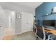 Cozy bedroom featuring a home office setup with a contemporary desk and chair at 12936 Freeman St, Windermere, FL 34786
