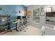 Modern bedroom with sleek desk, ergonomic chair, and natural light from the window at 12936 Freeman St, Windermere, FL 34786