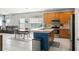 Open-concept kitchen with stainless steel appliances and dining area at 12936 Freeman St, Windermere, FL 34786