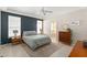Serene bedroom with tray ceiling, tiled floors, and calming color palette at 12936 Freeman St, Windermere, FL 34786