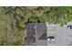 Birds eye view of roof in an established neighborhood with mature trees and plenty of parking at 130 Kristi Ann Ct, Winter Springs, FL 32708
