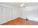 The bedroom features wood floors and a closet, with a ceiling fan for added comfort at 130 Kristi Ann Ct, Winter Springs, FL 32708