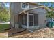 A screened porch extends the living space of this neutral-toned home with tidy landscaping at 130 Kristi Ann Ct, Winter Springs, FL 32708