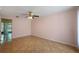 Living room featuring neutral walls, ceiling fan, and tile floors at 130 Kristi Ann Ct, Winter Springs, FL 32708