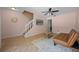 Inviting living area showcasing tile floors, a staircase, and a comfortable seating arrangement at 130 Kristi Ann Ct, Winter Springs, FL 32708