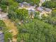 Aerial view of homes with verdant foliage, providing a sense of privacy at 1314 S Mellonville Ave, Sanford, FL 32771