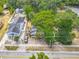 Aerial view of the home showcasing its fenced yard and mature trees at 1314 S Mellonville Ave, Sanford, FL 32771