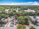 Aerial view of the home with property lines defined, nestled among mature trees at 1314 S Mellonville Ave, Sanford, FL 32771
