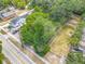 Aerial view of the lot, showing tree cover and proximity to other homes at 1314 S Mellonville Ave, Sanford, FL 32771