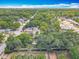Overhead view of a neighborhood with established homes and verdant landscaping at 1314 S Mellonville Ave, Sanford, FL 32771