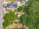 Aerial shot of a house highlighting the backyard pool and surrounding greenery at 1314 S Mellonville Ave, Sanford, FL 32771