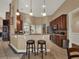 Spacious kitchen with a breakfast bar, stainless steel appliances, and ample cabinet space at 14315 Letham Grange Ct, Orlando, FL 32828