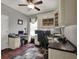 This spacious office features built-in cabinets and an area for multiple computer setups at 14315 Letham Grange Ct, Orlando, FL 32828