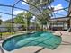 Sparkling screened-in pool with a hot tub and spacious patio area, perfect for outdoor relaxation and entertaining at 14315 Letham Grange Ct, Orlando, FL 32828