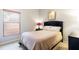 This bedroom features a double bed, carpeted floors, and simple decor at 1457 Waukon Cir, Casselberry, FL 32707