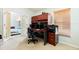 This office, attached to the main bedroom, includes storage, desk space, and plush carpeting at 1457 Waukon Cir, Casselberry, FL 32707